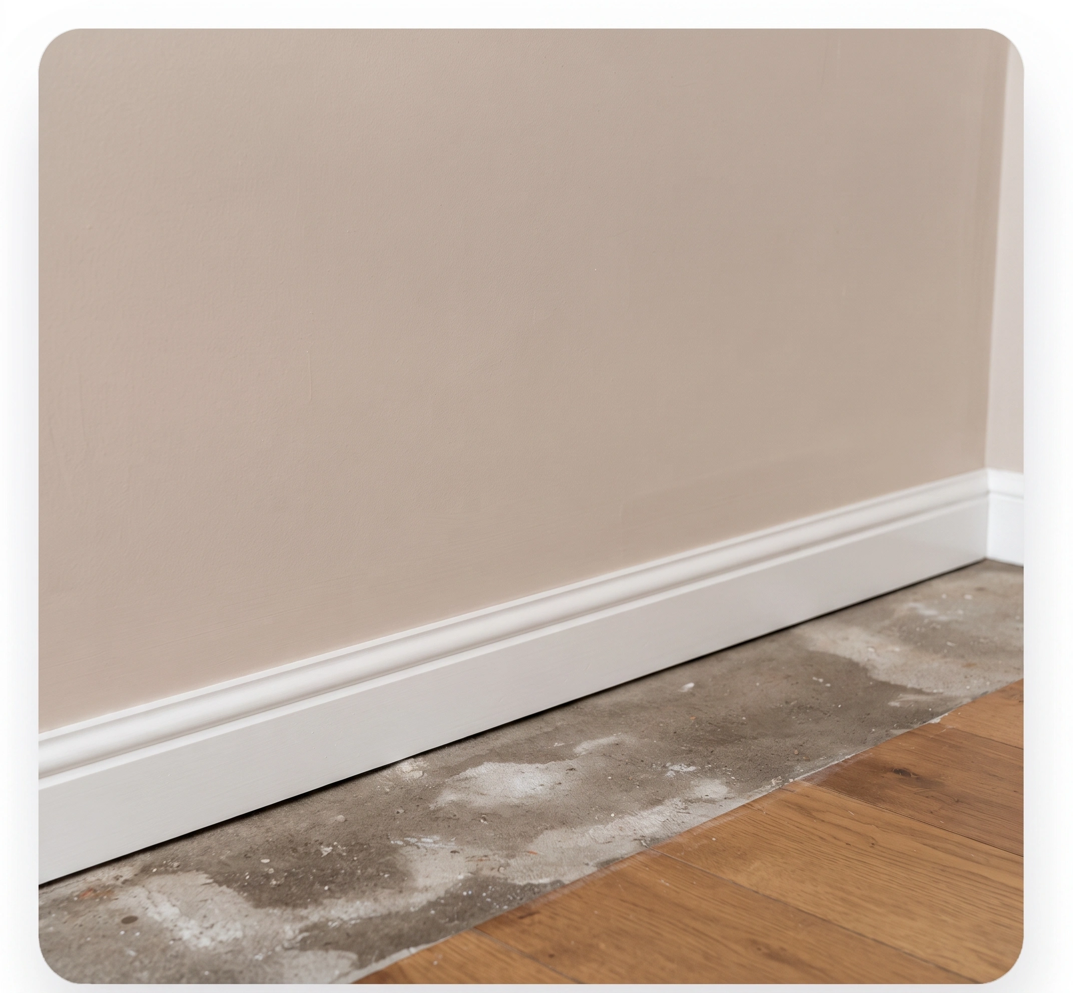 The same wall treated at the base, replastered and painted dry