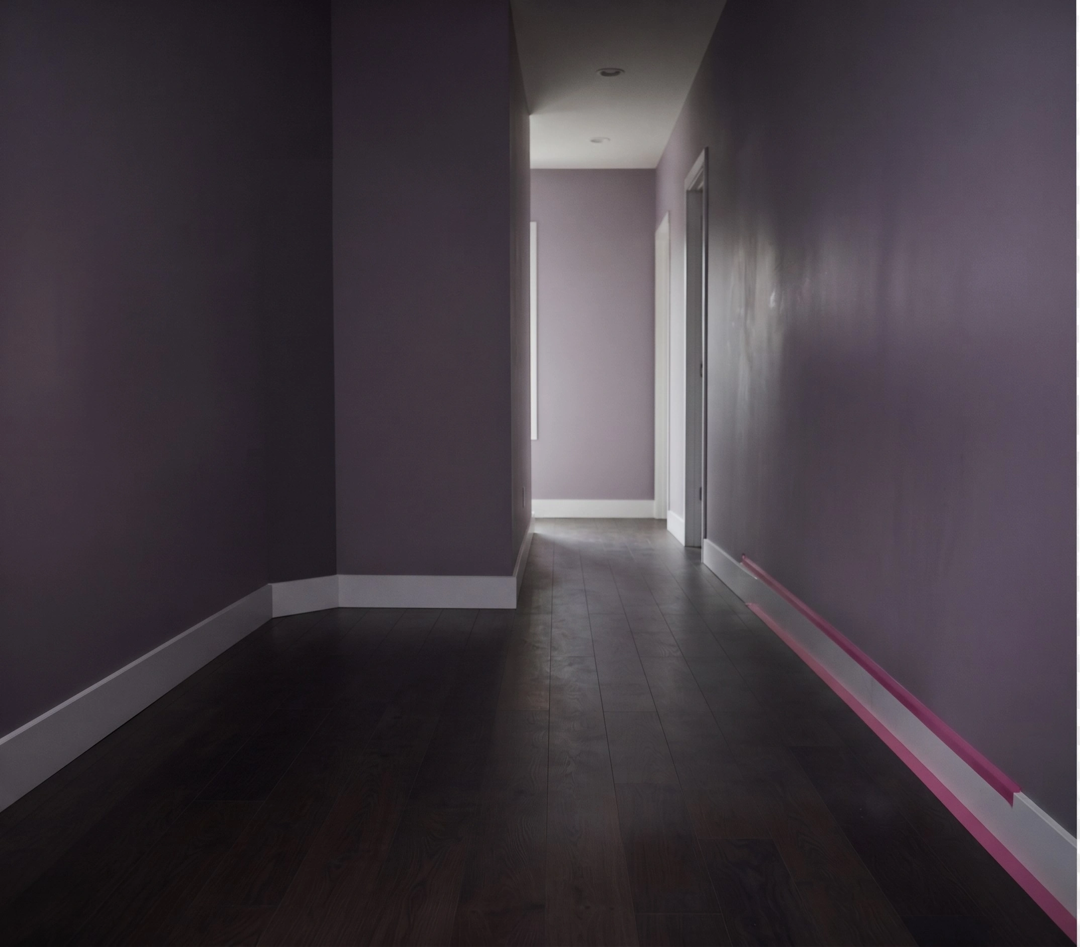 The same hall clear, boxes labelled in the right rooms and the bed rebuilt